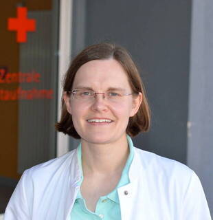 Dr.  Caroline Grupp