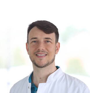 Dr.  Jens Holtappels