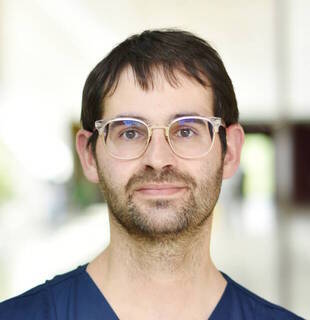 Dr.  Simon Ernst